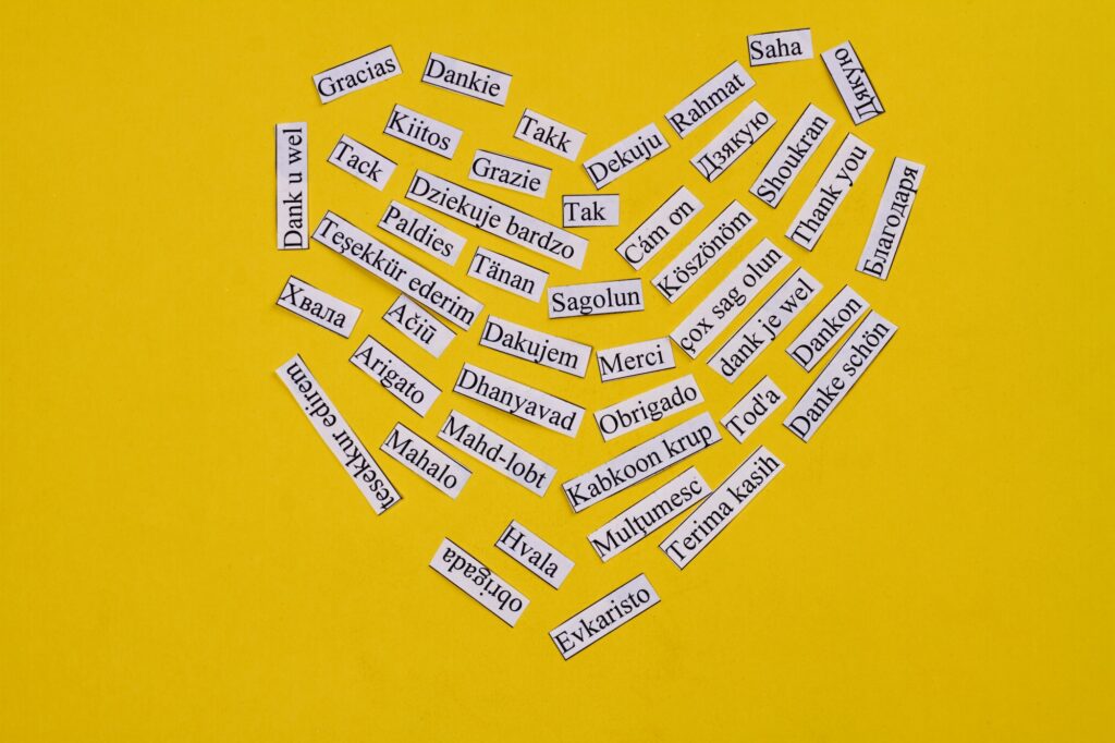 Heart made of many thank you words in many different languages.